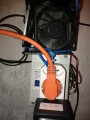 controller with orange extension cord plugged in